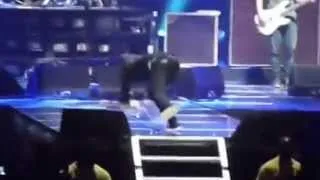 Dave Grohl Trips and Falls on Stage