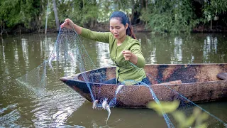 Cooking traditional food and grilled fish in my village