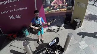 Trent, 10,  busking Heart of Gold by Neil Young