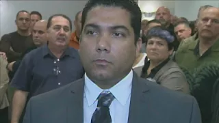 Peter Peraza receives support as he enters not guilty plea