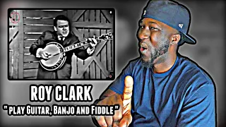 HOW IS HE DOING THIS?! Roy Clark play Guitar, Banjo and Fiddle | REACTION