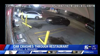 Woman charged after car crashes into restaurant on Broadway