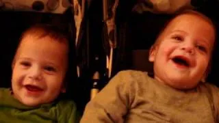 Twins baby laugh after sneezing