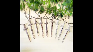 Wire-Wrapped Stone-Studded Sword Pendants - Detail