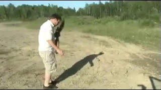Epic fail mAn tries to shoot rifle with one hand