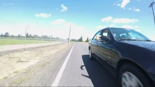 Passenger in car threatens Washington County bicyclist with knife