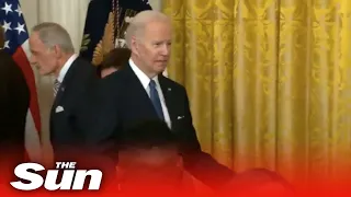 Biden 'looks LOST' as his staff fawn over Obama 'leaving him standing alone' at White House