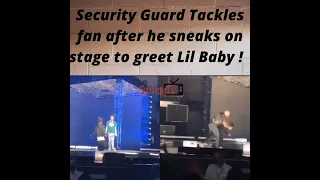 Fan Gets Tackled after sneaking on stage trying to meet Lil Baby !