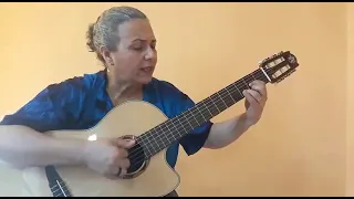 Canção Tocando em frente de Almir Sater interpretada por professora Liliane Francioni