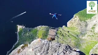 Base jumping from Kjerag cliff in Norway...