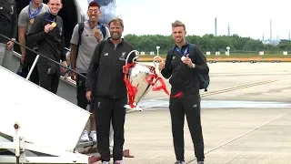 Champion League Champions Liverpool Arrive Back In UK With Trophy