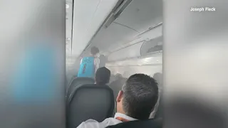 Spirit Airlines cabin fills with smoke after battery catches fire in overhead bin
