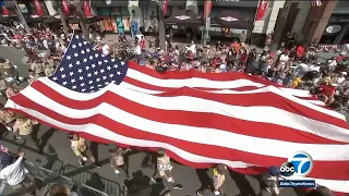 July 4th parade in Huntington Beach attracts thousands for fun, relief from heat