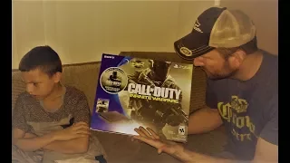 Dad tries to convert son to Playstation...