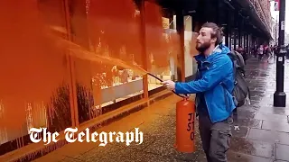 Just Stop Oil protesters spray Harrods with orange paint and block roads