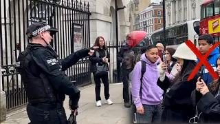 NOT ALLOWED 🚫 POLICE Officer confronts silly young man who grabbed the horse REINS