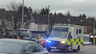 Scottish ambulance service , Mercedes sprinter ambulance responding past Coatbridge fire station