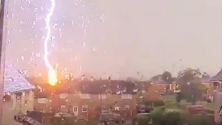 Moment lightning strikes house in Wales | UK weather