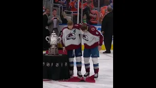 Avalanche pose with Clarence S. Campbell Bowl