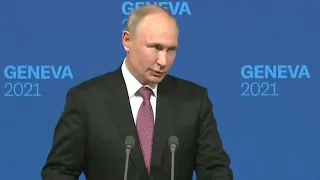 Putin chuckles, deflects when asked about Navalny