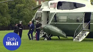 Biden RETURNS to DC from his Camp David 'vacation' on Marine One