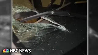 Spear thrown into windshield of moving car, police searching for suspect