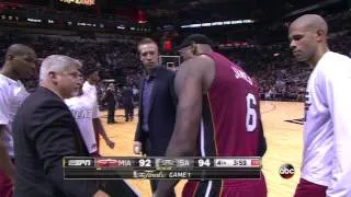 LeBron James cramps, gets carried to bench