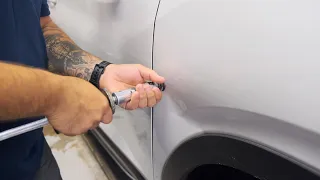 Paintless dent repair on fender of a Subaru Ascent | Dentless touch