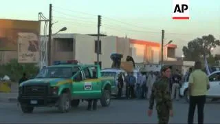 Aftermath of suicide bomb attack on busy cafe that killed 35