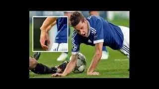 Julian Draxler (Schalke) and Carles Puyol (Barca) Broken his arm in UEFA Champions League