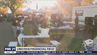 Eagles and Steelers fans tailgate side-by-side at Lincoln Financial Field