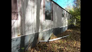 Abandoned Trailer in the Woods