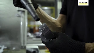 Vacuuming metal shavings at a milling machine - Automotive Industry
