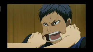 Aomine and Kise fighting over Kuroko