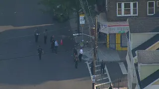 Investigation in Newark after several people shot (aerial view)