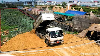 Opening New Project Filling Land Use Trucks 5T & Bulldozer Pushing Stone Into Water & Trash