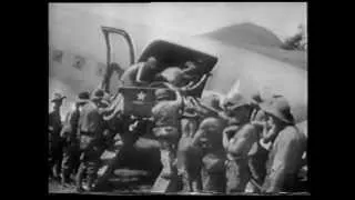 Aussie & US forces drive Japanese from Lae, New Guinea -1943