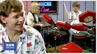 1984: BILL BRUFORD on the SIMMONS ELECTRONIC DRUM KIT | Micro Live | Retro Tech | BBC Archive