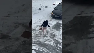 Woman hilariously slips on icy road