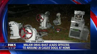 Major drug bust leads officers to around 20 caged dogs at home