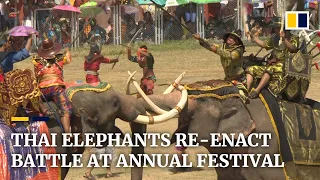 Elephants re-enact battle at an annual festival in Thailand