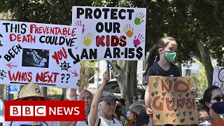 Tens of thousands march for gun control in US after Texas school shooting - BBC News