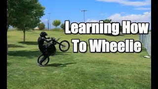 LEARNING HOW TO WHEELIE MY SURRON PART 1