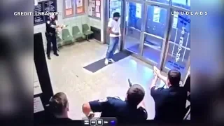 Man Armed with Knife Walks into Police Station