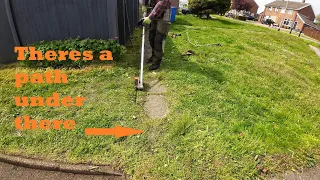 Peeling away years of overgrown edges and paths | grass cutting and edging satisfaction