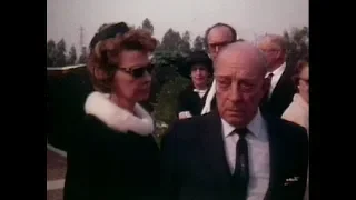 Buster Keaton cries at the funeral of Stan Laurel.