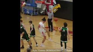 We film basketball. Benet Academy's Kyle Thomas Slam Dunks.