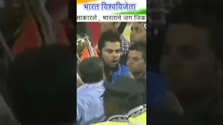 Kohli and Raina deliberately hitting a guy on   his head with the 2011 World Cup trophy