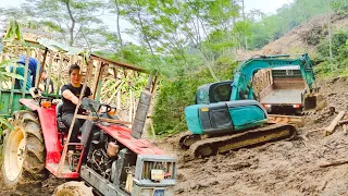 excavator support Car,tractor Wooden transport  on the mountain,The road is muddy.