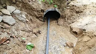 Clearing a plugged culvert